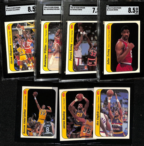 1986-87 Fleer Basketball Partial Sticker Set (7 of 11 stickers) inc. 4 Graded (Julius Erving SGC 8.5, Patrick Ewing SGC 7.5, Dominique Wilkins SGC 8.5, Akeem Olajuwon SGC 8.5) - Missing Michael...