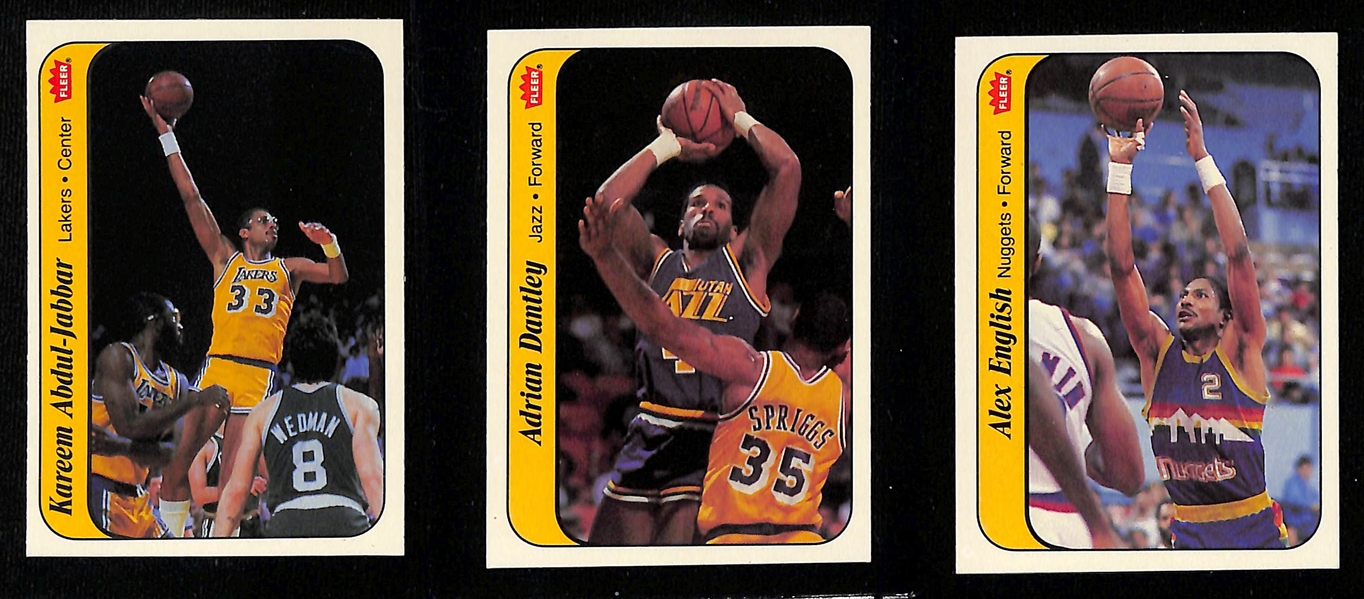 1986-87 Fleer Basketball Partial Sticker Set (7 of 11 stickers) inc. 4 Graded (Julius Erving SGC 8.5, Patrick Ewing SGC 7.5, Dominique Wilkins SGC 8.5, Akeem Olajuwon SGC 8.5) - Missing Michael...