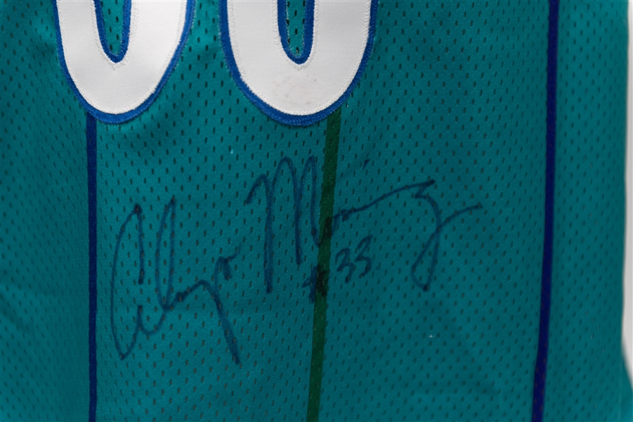 Alonzo Mourning Signed Charlotte Hornets Jersey - Made by Champion, Size 48 (JSA) - Presented to Halftime Performer Jeremy Kable