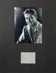 Actor Errol Flynn (Best Known for 1938 Robin Hood Movie) Signed Cut (Dated 9/28/1947) Matted with His Photo (JSA Auction Letter)