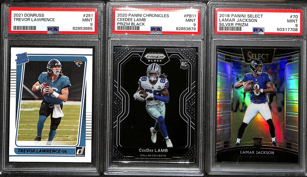 Lot of (3) Graded Football Rookie Cards - 2018 Select Lamar Jackson Silver (PSA 9), 2020 Chronicles Prizm Black CeeDee Lamb (PSA 10), 2021 Donruss Trevor Lawrence (PSA 9)