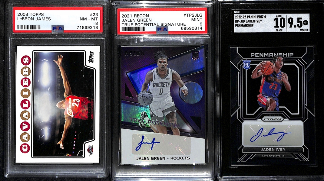 Lot of (3) Graded Basketball Cards- 2008-09 Topps LeBron James (PSA 8), 2021-22 Recon Jalen Green Rookie Autograph (PSA 9), 2021-22 Prizm Jaden Ivey Rookie Autograph (SGC 9.5) (10 Auto)