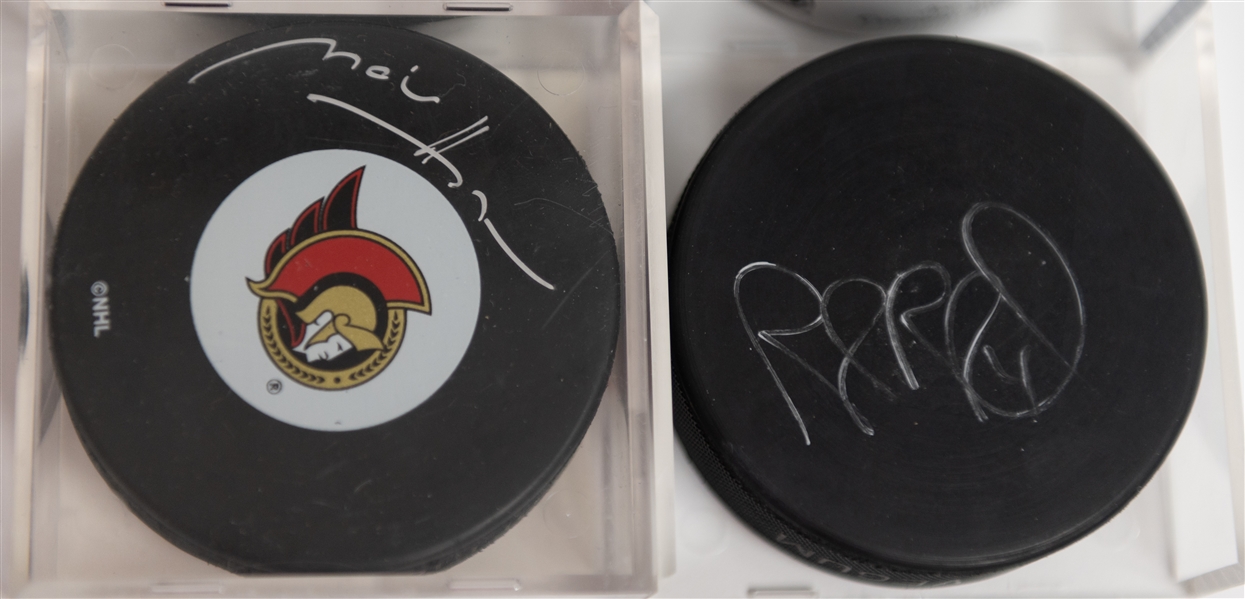 Hockey Autograph Lot (6) Pucks (w. Manon Rheaume, Marian Hossa, Joe Sakic, Eric Dejardins, Rob Blake, Olaf Kolzig) & Manon Rheaume Signed Card - JSA Auction Letter