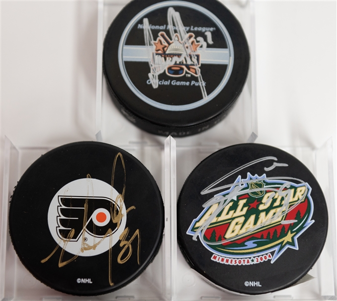 Hockey Autograph Lot (6) Pucks (w. Manon Rheaume, Marian Hossa, Joe Sakic, Eric Dejardins, Rob Blake, Olaf Kolzig) & Manon Rheaume Signed Card - JSA Auction Letter