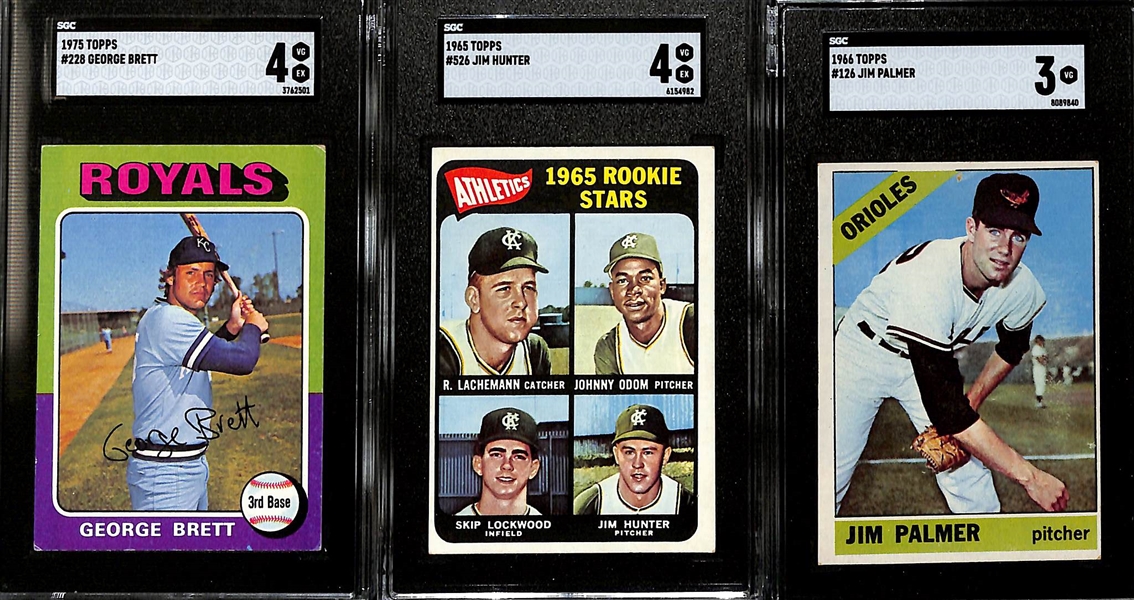 HOFer Graded Topps Rookie Card Lot - 1975 George Brett (SGC 4), 1965 Jim Catfish Hunter (SGC 4), 1966 Jim Palmer (SGC 3) 