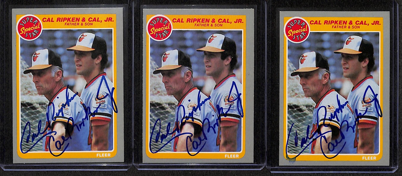 (3) Signed 1985 Fleer Cal Ripken Jr & Sr. (JSA Auction Letter)