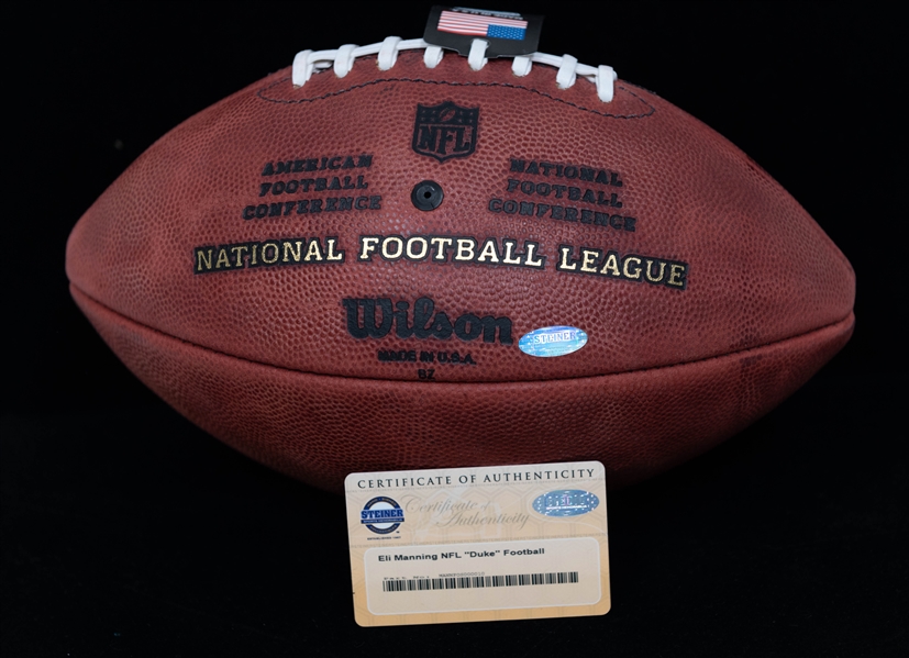 Signed Eli Manning Football + (Steiner COA)