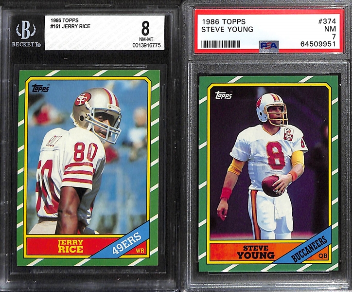 (6) Graded Football Cards w. 1986 Topps Jerry Rice Rookie (BGS 8), Steve Young (PSA 7), John Elway (PSA 8), Wilbur Marshall (PSA 8).  Also Includes 2023 Donruss CJ Stroud (PSA 9) & 2020 Spectra Tom...
