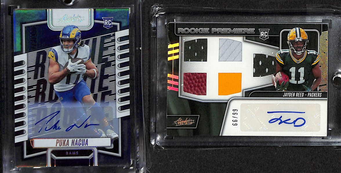 Lot of (23) Modern Football Cards W. Puka Nacua Absolute Rookie Autograph /199, Jayden Reed Rookie Premiere Autograph /99, Jayden Reed Silver Prizm Draft Picks Autograph, and Anquan Boldin Silver...