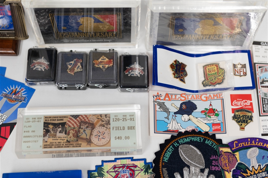 Lot of Various Commemorative Sports Memorabilia w. (2) 1-Troy Ounce .999 Larry Doby Silver Coins, (8) Super Bowl Patches, (2) 125th MLB Anniversary Plaque, (4) All Star Game Tickets, and more!