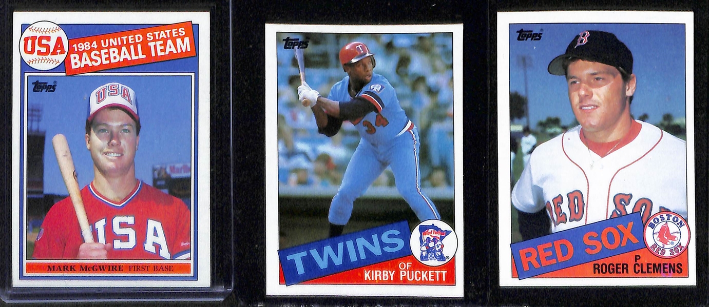 Lot of (2) 1980s Topps Baseball Complete Sets - 1983 & 1985 with Gwynn/Boggs/Sandberg/McGwire/Puckett/Clemens Rookie Cards