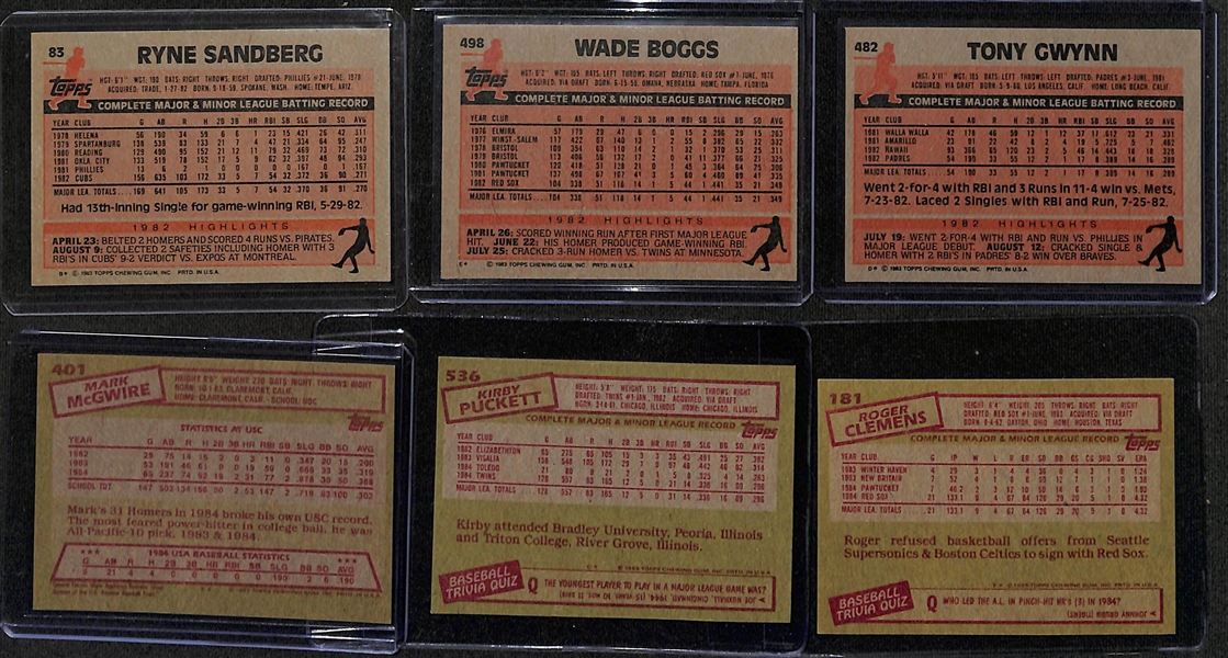 Lot of (2) 1980s Topps Baseball Complete Sets - 1983 & 1985 with Gwynn/Boggs/Sandberg/McGwire/Puckett/Clemens Rookie Cards