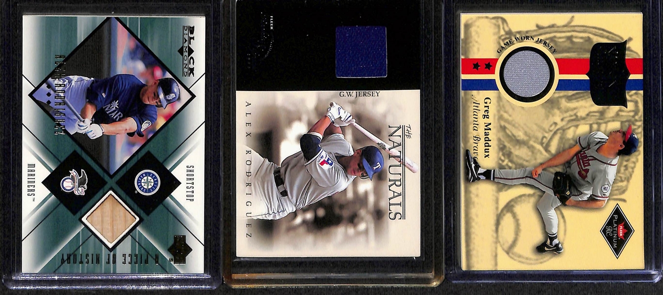 Lot of (18) Game-Used Memorabilia Baseball Cards (some #'d) w. Frank Robinson, Eddie Mathews, & Ken Griffey Jr. 