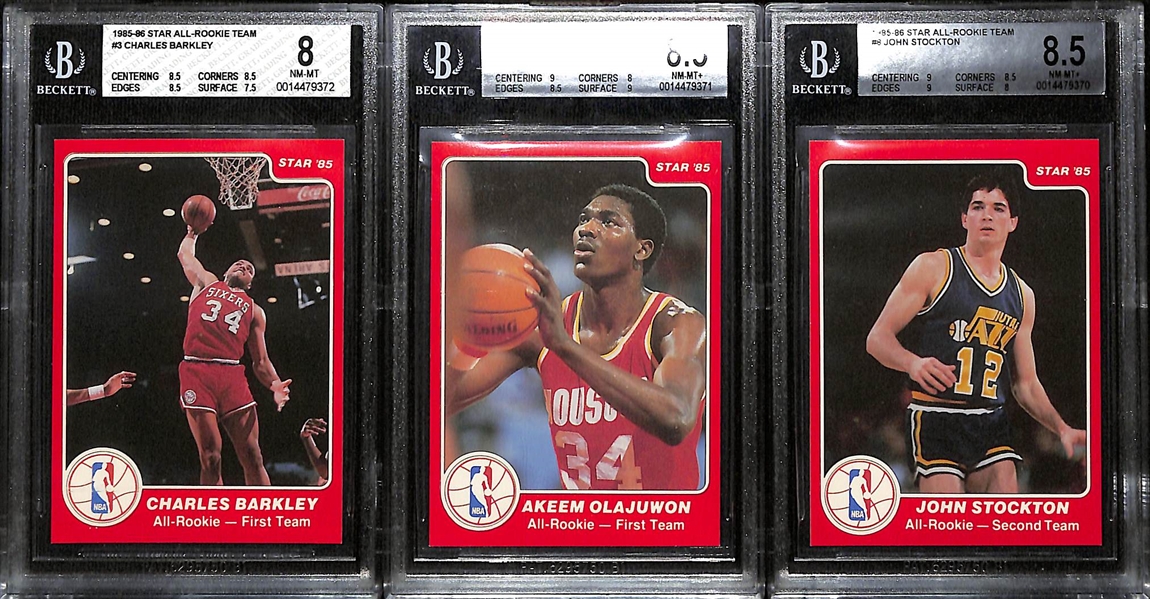 Lot of (10) 1985-86 Star All Rookie Team Cards - Charles Barkley (BGS 8), Hakeem Olajuwon (BGS 8.5), John Stockton (BGS 8.5), Sam Bowie, Sam Perkins, Vern Fleming, Otis Thorpe, Kevin Willis, Tim...