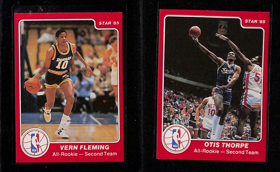 Lot of (10) 1985-86 Star All Rookie Team Cards - Charles Barkley (BGS 8), Hakeem Olajuwon (BGS 8.5), John Stockton (BGS 8.5), Sam Bowie, Sam Perkins, Vern Fleming, Otis Thorpe, Kevin Willis, Tim...