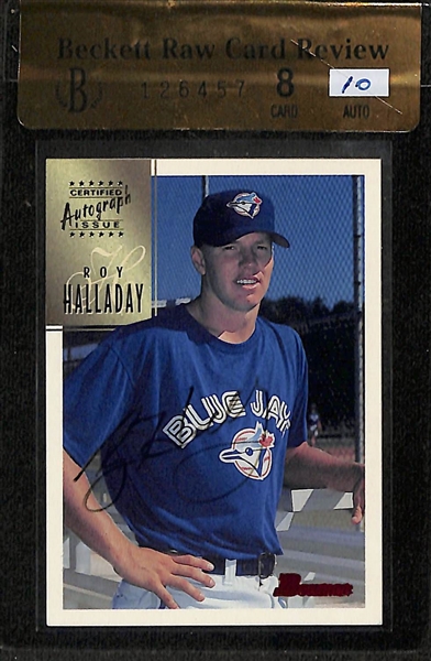 Lot of (2) Graded Baseball Rookie Autographs- 1997 Bowman Roy Halladay (BGS RCR 8), 201 Elite Extra Edition Paul Goldschmidt (SGC 8.5) (#/820)