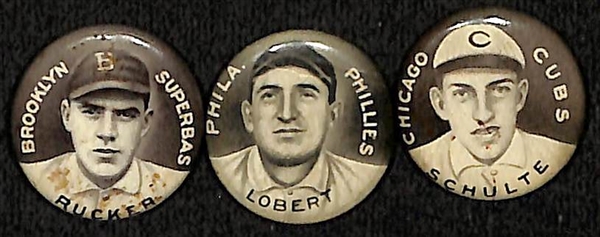 Lot of (6) 1910-12 Sweet Caporal P2 Pins & (2) 1932 Orbit Gum Pins w. 1912 Sweet Caporal Fred Clarke Large Letters BVG 4.5