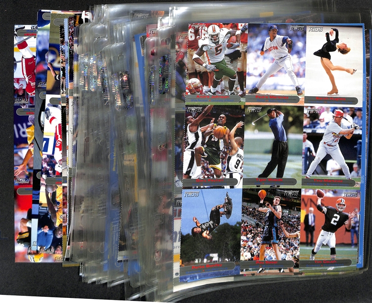 Lot of (60+) 2001-2004 Sports Illustrated Kids Un-Cut Sheets w. (2) Tiger Woods, (4) Michael Jordan, (3) Serena Williams (RC), Michael Phelps (RC)....