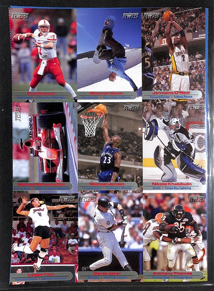 Lot of (60+) 2001-2004 Sports Illustrated Kids Un-Cut Sheets w. (2) Tiger Woods, (4) Michael Jordan, (3) Serena Williams (RC), Michael Phelps (RC)....