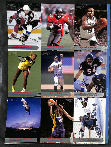 Lot of (60+) 2001-2004 Sports Illustrated Kids Un-Cut Sheets w. (2) Tiger Woods, (4) Michael Jordan, (3) Serena Williams (RC), Michael Phelps (RC)....
