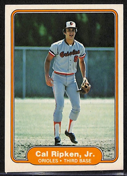 Baseball Card Lot - 1975 Topps George Brett Rookie (SGC 5), Topps 1961 Ernie Banks All-Star, 1982 Fleer Cal Ripken Jr. Rookie Card
