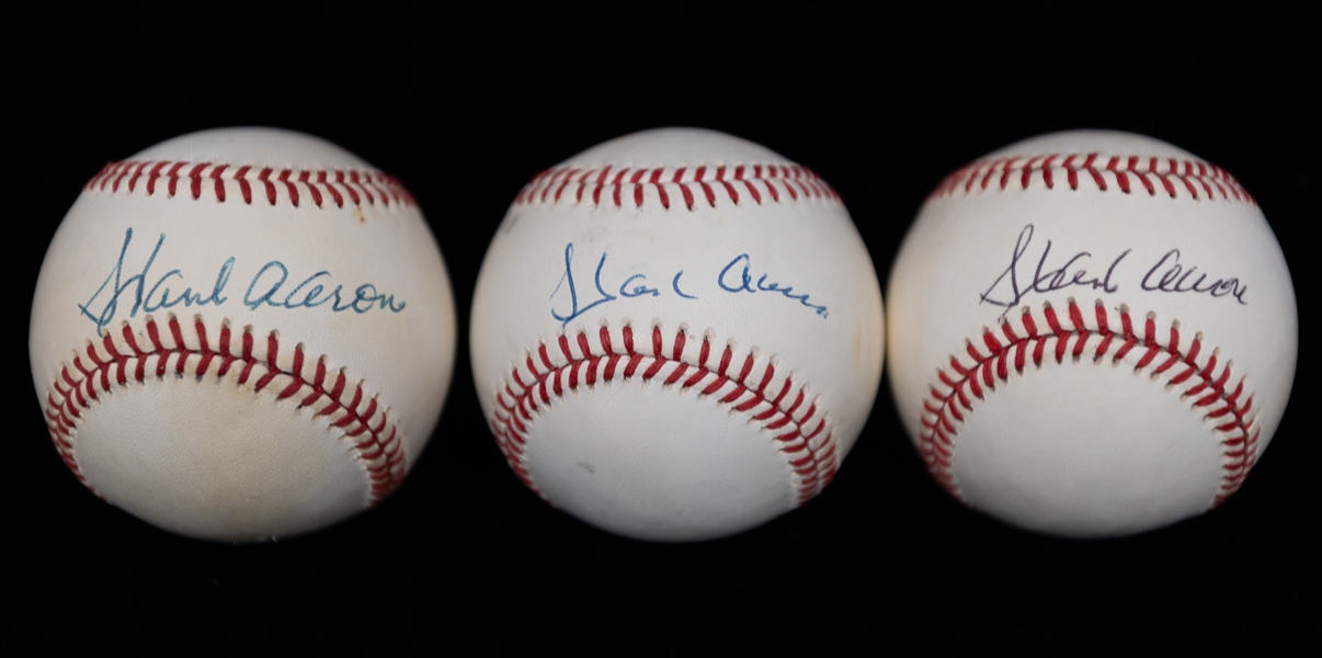 Lot of (3) Hank Aaron Signed Baseballs (+JSA Auction Letter)