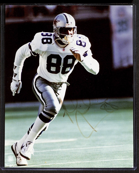 Lot of (4) Mostly Faded Signed Dallas Cowboy 8x10 Pictures w. Roger Staubach/Tony Dorsett, more +(JSA Auction Letter)