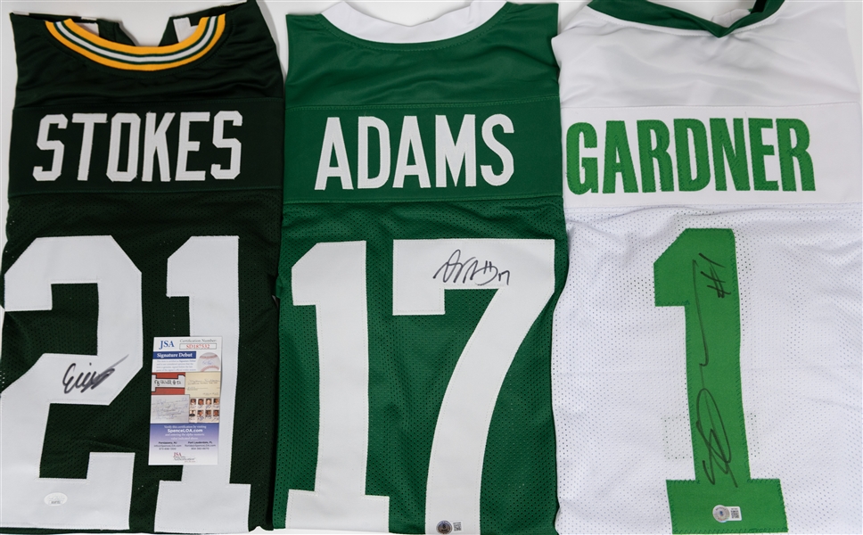 Lot of (3) Signed Custom Football Jerseys w. Sauce Gardner, Davante Adams, Eric Stokes  (JSA & Beckett)