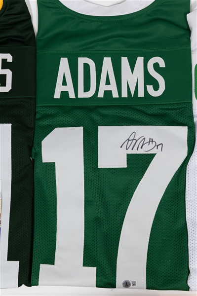 Lot of (3) Signed Custom Football Jerseys w. Sauce Gardner, Davante Adams, Eric Stokes  (JSA & Beckett)
