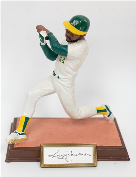 Signed Rollie Fingers Baseball Hat and Signed Figurine & Reggie Jackson Figure (+JSA Auction Letter)
