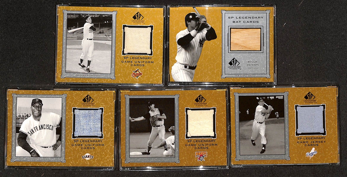 (24) 2001 Upper Deck Legendary Cuts Relic Cards w. (2) Brett, Reggie Jackson, (3) McCovey, Mazeroski, Hodges, B. Robinson, +