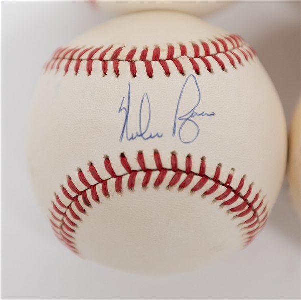 Lot of (4) Signed Baseballs From the Howard Greene Collection w. Stan Musial, Nolan Ryan,Milt Thompson, Will Clark (JSA Auction Letter)
