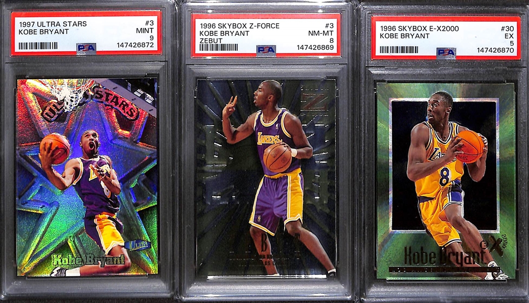 Kobe Bryant Lot - 1996 Skybox Z-Force Zebut Rookie (PSA 8), 1996 E-X2000 Rookie (PSA 5), 1997 Ultra Stars (PSA 9)