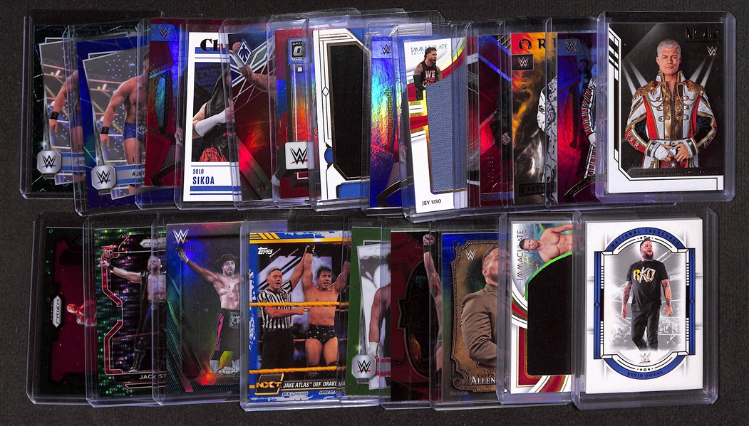 Lot of (23) Serial Numbered WWE Cards w. Cody Rhodes & Seth Rollins