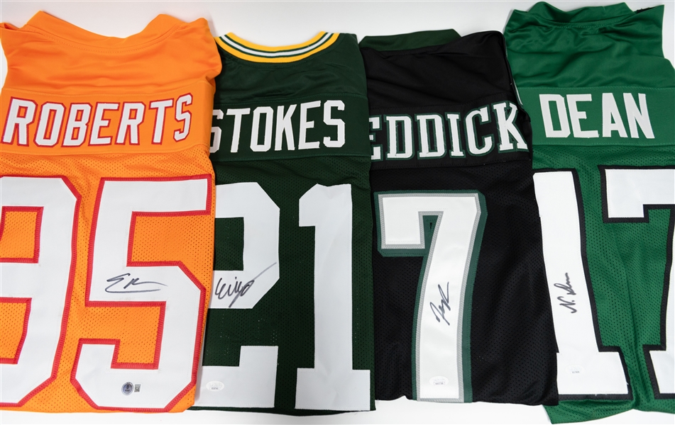 Lot of (4) Signed Custom Football Jerseys w. Nakobe Dean, Haasan Reddick, Eric Stokes, & Elijah Roberts (all COAs)